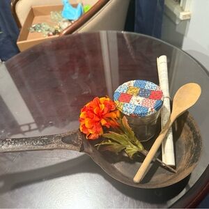 Rustic Cast Iron Skillet with Wooden Spoon